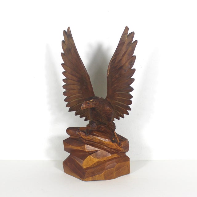 Amazing carved wood eagle folk art. Awesome gift for the bird collector. Makes a great statement on a shelf with plants....