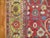 An early 20th century Persian Mahal rug with a red ground and light green abrashed border. 10'11'' x 172'' Exemplary...