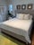 Barely used bed frame from Palecek, in perfect condition. Plantation hardwood frame, rails and legs hand-wrapped with...