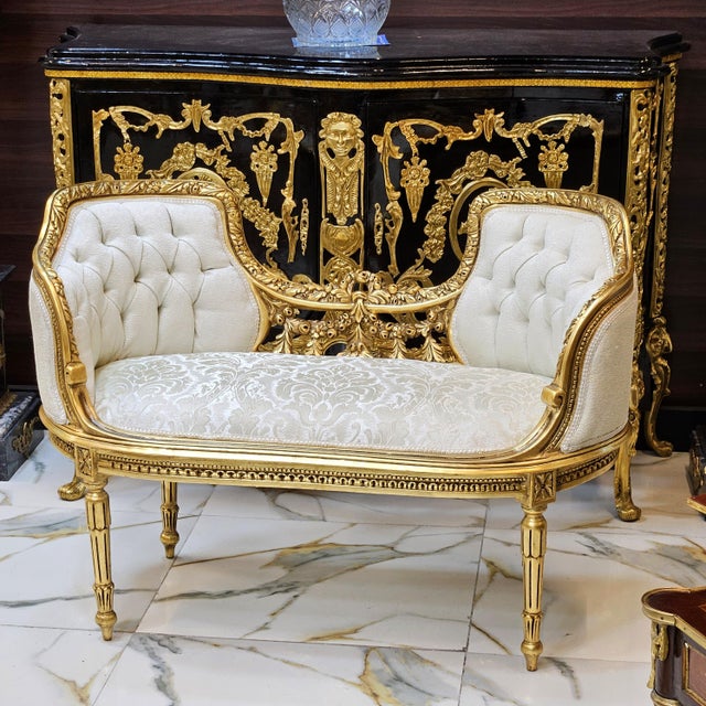 Fall in love with the timeless elegance of this exquisite French-style bench. This refined piece showcases a beautiful...