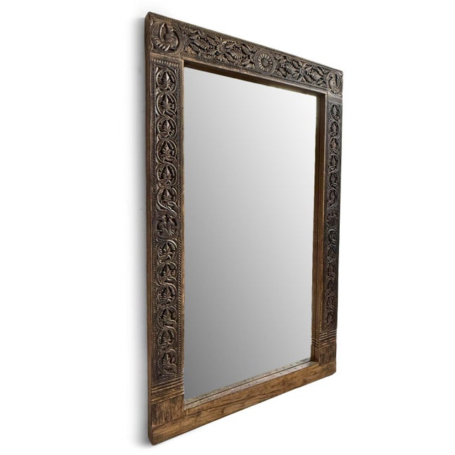 Impressive full-length mirror with vintage original Indian carved wood architectural element as the frame. Deep, naturally...
