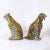 Striking pair of mid century snarling leopard figures or sculptures crafted in terra cotta, hand decorated and glazed....
