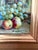 Petite vintage fruit still life, oil on board, featuring clusters of purple and green grapes, apples, and a green vessel...
