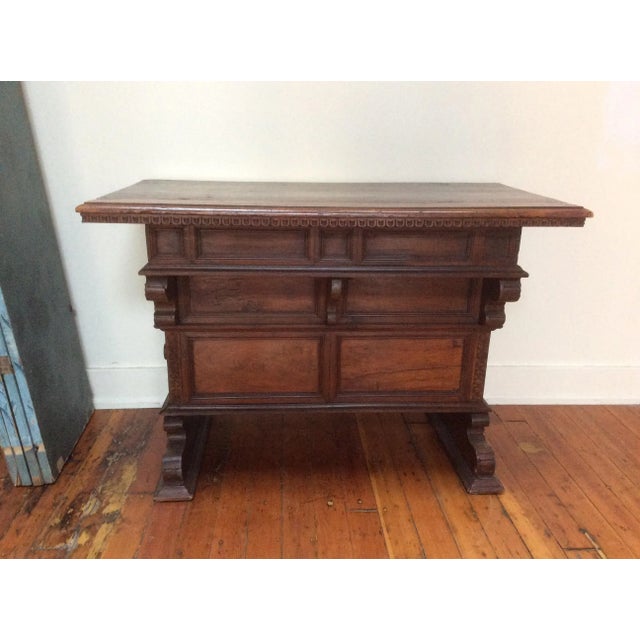 Interesting antique walnut Tuscan table with a drawer the opens on both sides. This is a 19th Century reproduction of an...