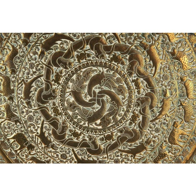 This is an impressive large late 19th Century antique brass charger, which is octagonal in shape and having marvellous...