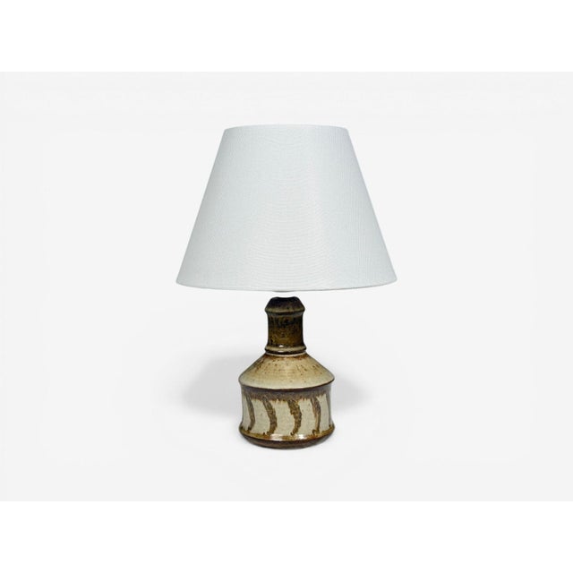 Joseph Simon, Söholm, Danish Mid-Century Modern, Table Lamp, Beige Stoneware, Denmark, 1960s A petite beige stoneware...