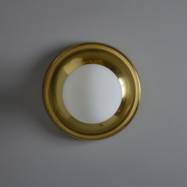 Petite Brass 1960s Castiglioni Brass 'Light Ball' Wall or Ceiling Lamp for Flos. Designed in 1965, this light comes with...