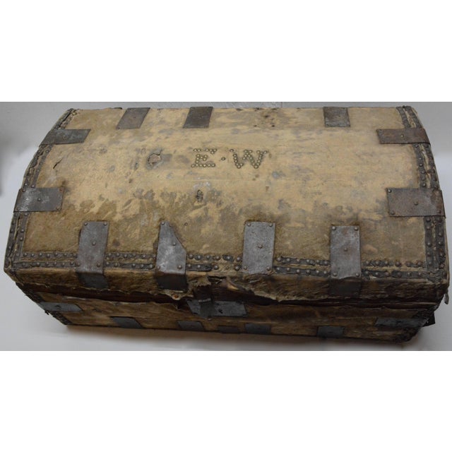 We are featuring a rustic trunk which is made of wood and covered in animal hide and finished with metal brackets and...