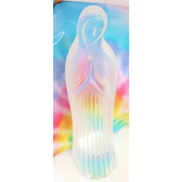This exquisite Madonna is so typical of Lalique. A sensitive rendition by the world's most loved crystalliere, Lalique of...