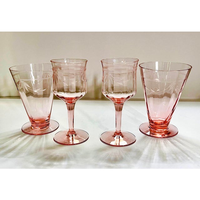 Wine glasses measure 5 inches tall, 2 wide at the top and 2 1/4 inches at the bottom. Water glasses measure 4 1/2 inches...