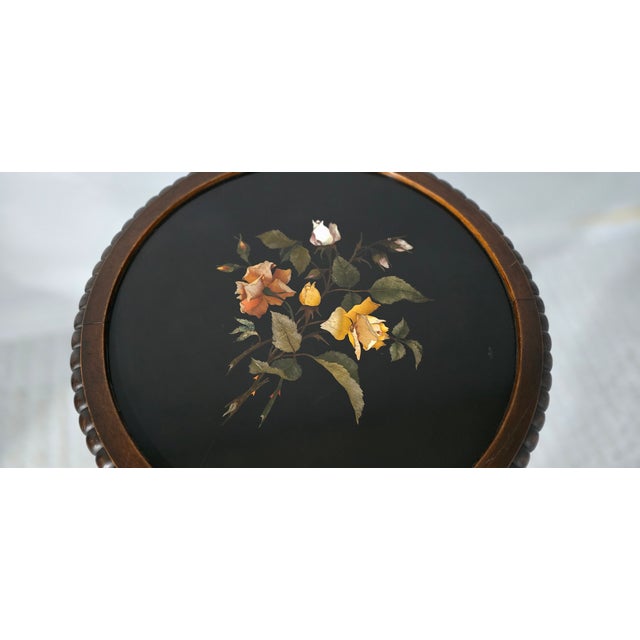 A superb Victorian mahogany centre table, possible Italian, with a wonderful pietra dura marble top depicting roses,...