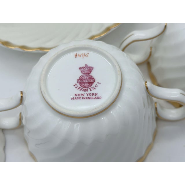 12 Tiffany & Company Mintons 'Gold Crocus' Pattern Twin Handled Cups & Saucers, England Circa 1950 This exquisite set of...