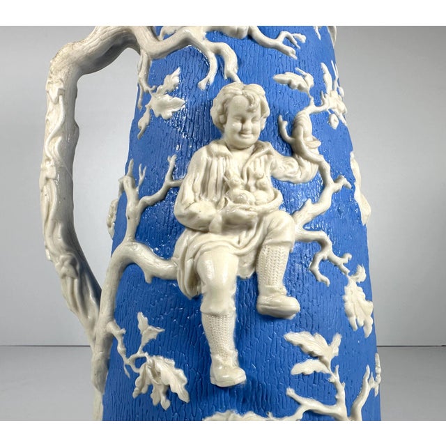 Rare & Original Antique Parian Boy Climbing Tree, Porcelain Pitcher for your consideration. The pitcher is the largest...