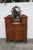 This rare Gentlemen's Chest and Mirror made out of wood, solid wood, solid oak, solid tiger oak, veneer, mirror, and...