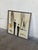 This striking canvas painting features an abstract composition depicting two figures in neutral and dark tones. Framed...