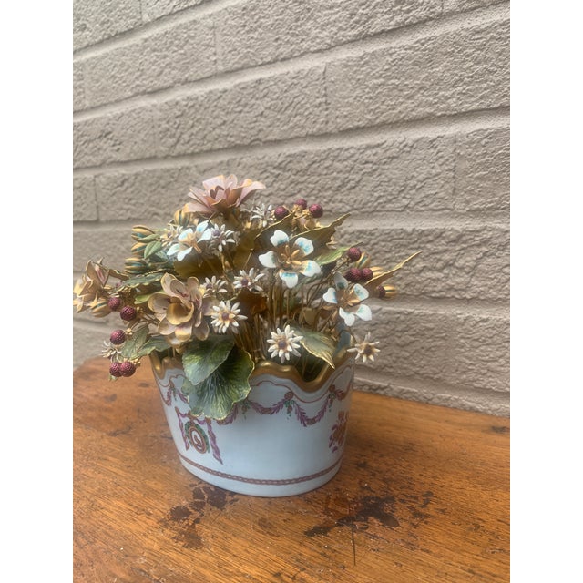 A gorgeous arrangement of enamel flowers, "Fleurs Des Siecles" By Jane Hutcheson for Gorham Circa 1970s Enamel flowers, in...