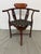 Design Plus Gallery presents a Corner Armchair with Asian Influence. The chair is made of finely hand-carved quality...