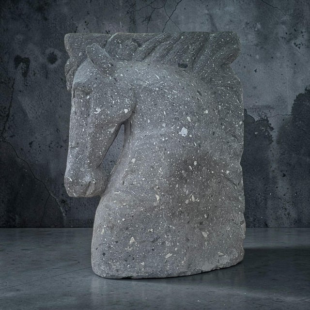 Custom made office desk comprised of two solid stone and concrete mixture horse heads. Each horse head was hand chiseled...