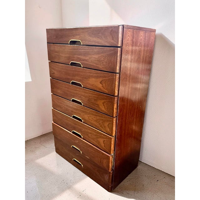 A rare West German men's chest of drawers from the 1960s, combining expressive mid-century design with thoughtful...