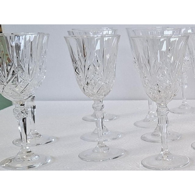 An exclusive set of 20 fine crystal wine glasses. Produced in the mid-1980s, these glasses represent the pinnacle of...