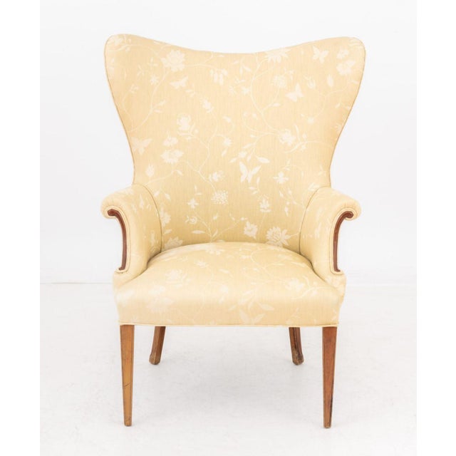 Botanical and Butterfly Print Beige Linen Upholstered Wingback Arm Chair, on four tapered wood legs. 44.25" H x 31.25" W x...