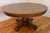 Antique Arts & Crafts round pedestal tiger oak dining table. Built from a premium grade of white oak with bold quartersawn...