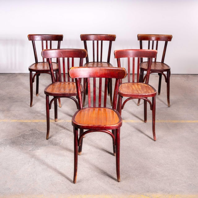1950’s Tri-Slat Two Tone Bentwood Dining Chairs – Set Of Four. Classic bistro chairs made in France by the maker Baumann....