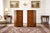 Elegant pair of Early 20th Century Federal Style Mahogany Cabinets. Each stand has five dovetailed drawers with glass...
