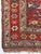 1920s Antique Kurdish with Flower Border Variations of Reds Rug 3.9 x 5.10 For Sale - Image 5 of 10