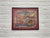 Mid Century Modern bird painting featuring two vibrant birds meeting among swirling flowers and leaves in this lively...