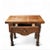 This charming early 20th-century French Provincial side table brings timeless elegance and functionality to any space....