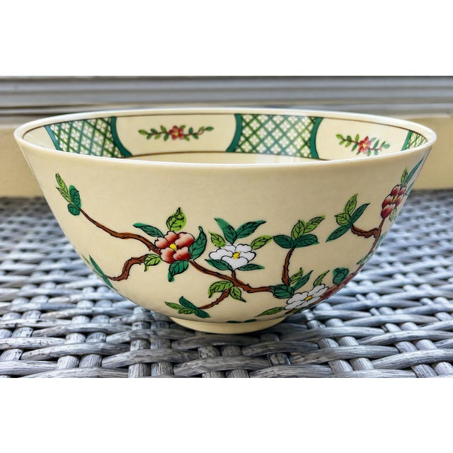 Apple blossom design on an antique white background. Very pretty color combination. The interior part of the bowl near the...