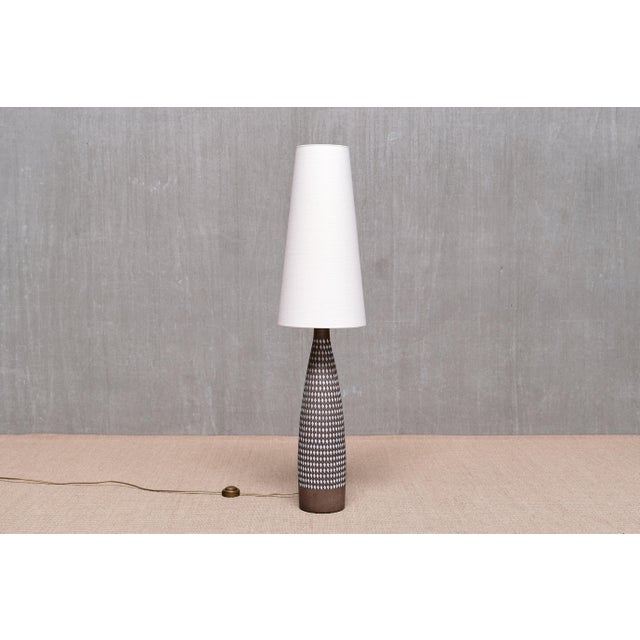 This very rare floor lamp was designed by ingrid atterberg and produced by upsala ekeby in sweden. The range of this...