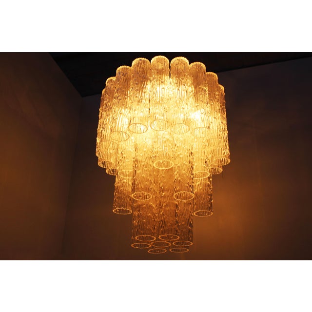 An impressive Italian Mid-Century Modern Tronchi chandelier, attributed to Toni Zuccheri for Venini, dating from the...