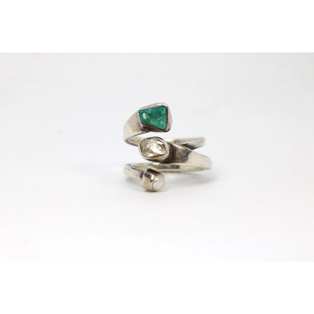 This is part of Chairish’s Fine Jewelry assortment. Chic Modernist Sterling Silver 3 Gemstone Bypass Ring by jewelry...