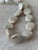 Absolutely stunning vintage pearl necklace with disc shape pearls, and sterling silver clasp.