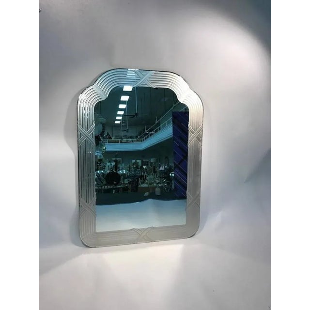 An exceptional Italian, etched glass and carved wall mirror with ribbon design in the style of Lupi Cristal Luxor, circa...