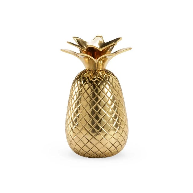 Metal Candleholder In The Shape Of A Pineapple With A Polished Brass Finish Clean with a dry cloth
