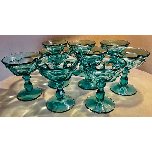 These items are a set of 9 vintage preowned champagne coupes or sherbet glasses. These would be an excellent addition to...