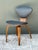 This vintage Cherner-style dining chair captures the sculptural elegance and refined craftsmanship that define mid-century...