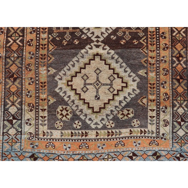 Textile Antique Persian Lori Rug With All-Over Geometric Tribal Medallion Design 4'5 X 8'8 For Sale - Image 7 of 11