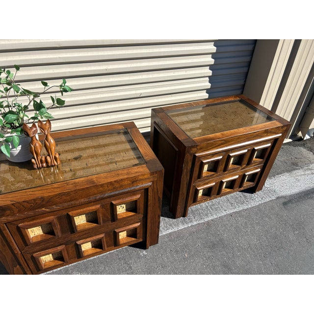 Beautiful oak end tables with cork inlays and glass tops. Great vintage condition. Smooth sliding drawers. Statement...