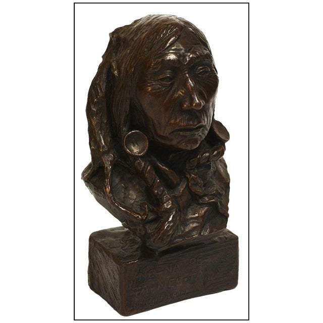 The artwork here, "Eagle Calf", is a wonderful depiction of the bust of a distinguished Native American man, that is...