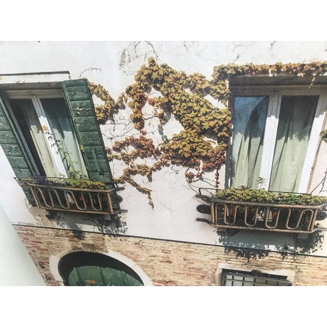 Picture printed on a walnut board with metal balconies and bars. And a cut out window. with dimensions: - 60cm. - 40 cm. -...