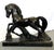 Striking black stallion figure from the mid 20th century. The piece is made of ceramic with a black cold painted finish...