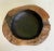 Here is a beautiful, natural wood bowl that has been hand-carved. I believe the center is burned black (but it could also...
