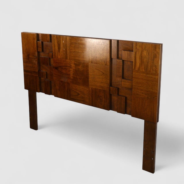 A striking example of mid-century Brutalist design, this queen-size headboard from Lane's Staccato collection features the...