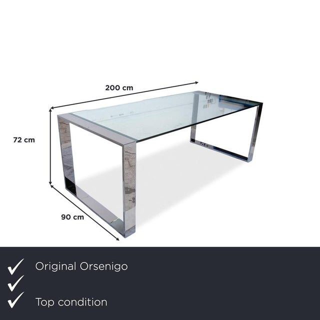 This dining table from the renowned Italian manufacturer Orsenigo is a true dream for lovers of modern, minimalist design....