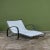 Late 1940s or early 1950s double width patio lounge chair by Walter Lamb predating his partnership with Brown Jordan. The...