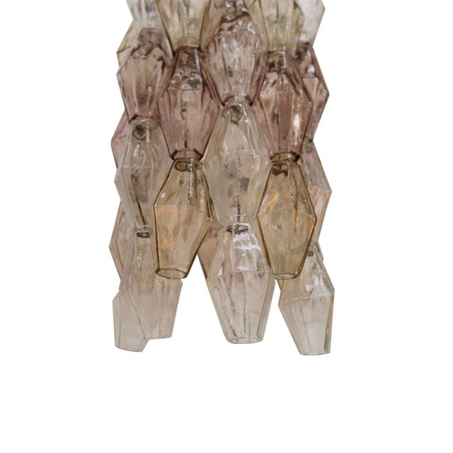 Pair of wall lights with four lightpoints,“poliedri” model designed by carlo scarpa, edited by venini. Composed by murano...